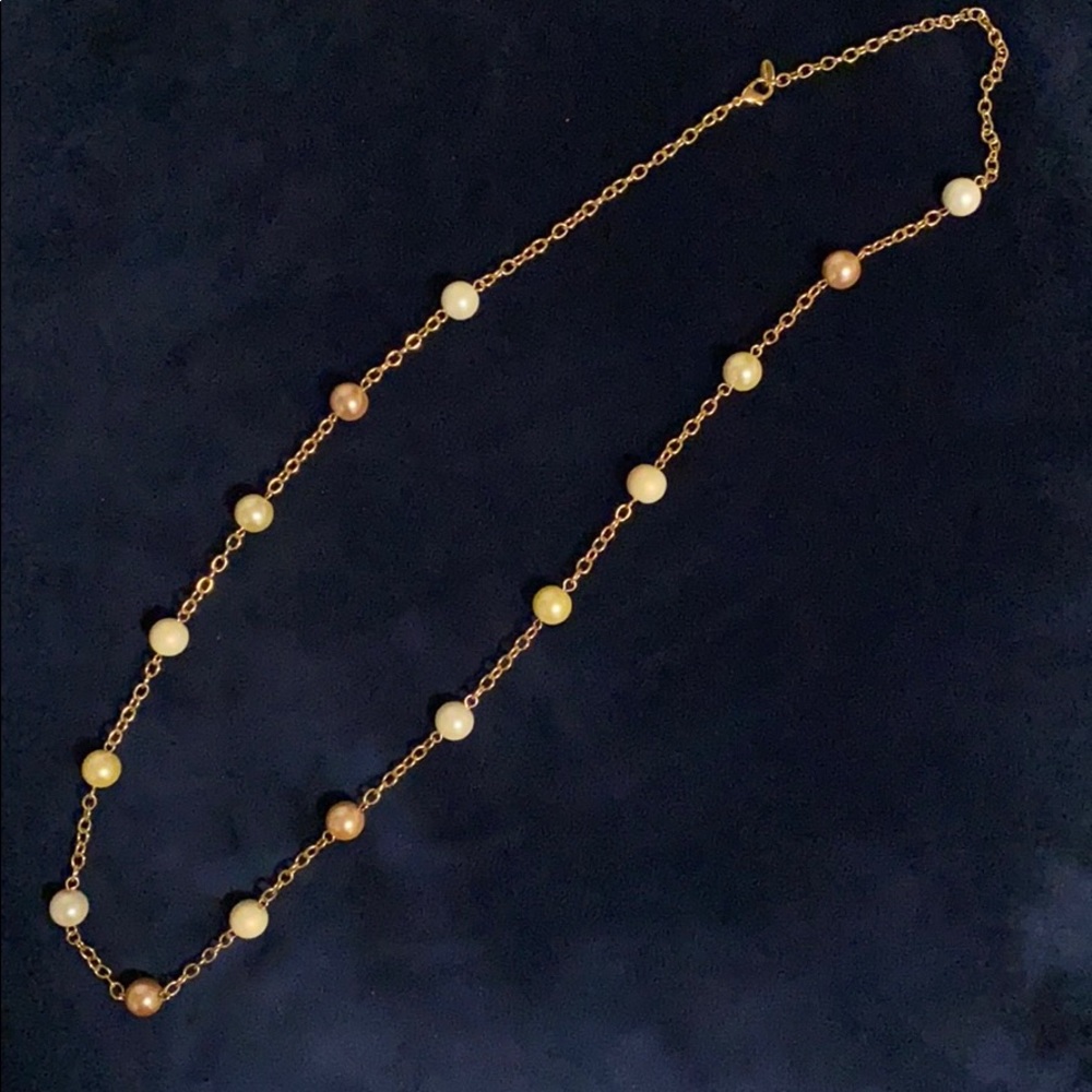 Faux pearl necklace in gold chain by Cezenne
